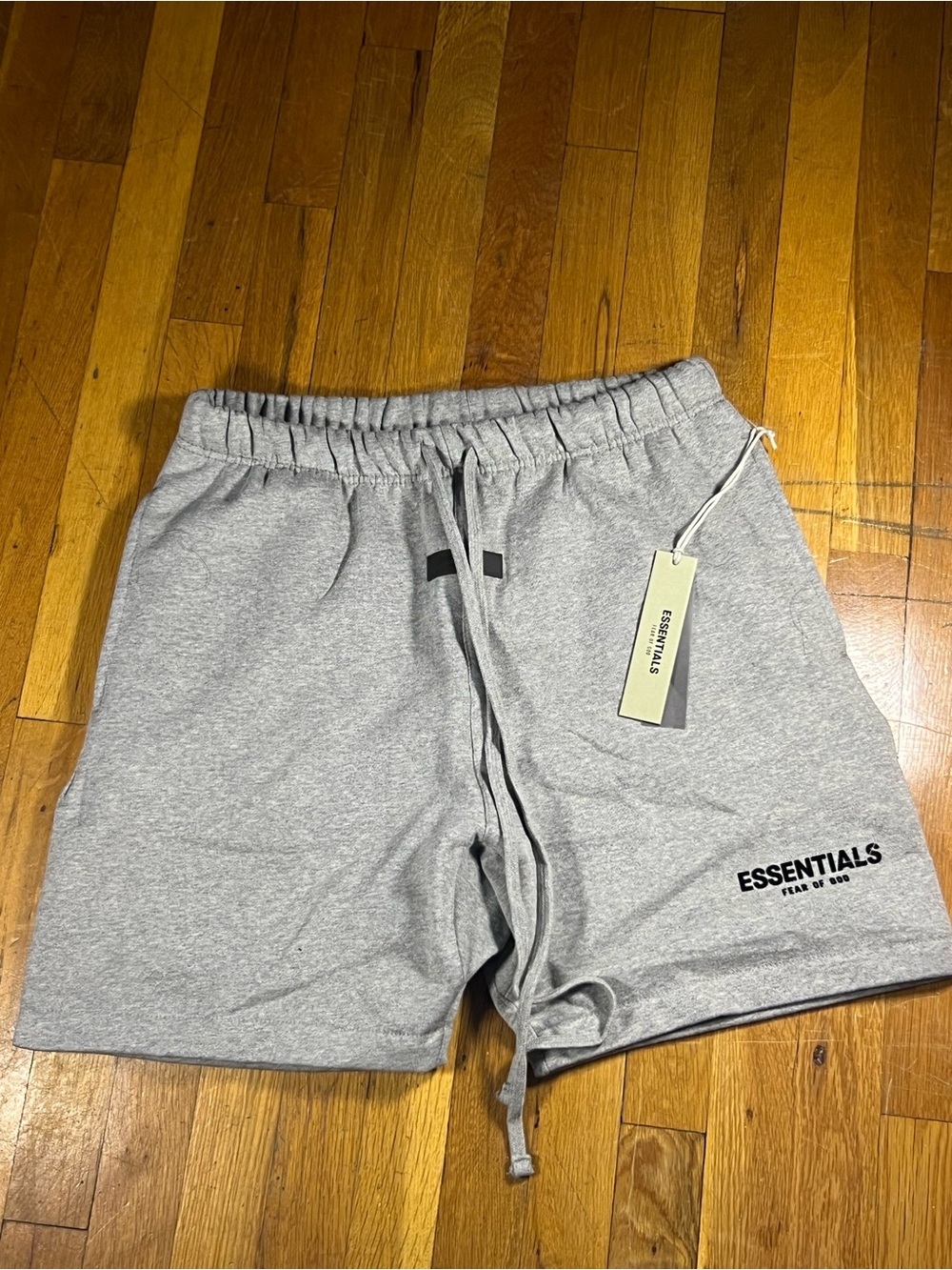 ESSENTIALS Men’s Light Gray Logo Athletic Shorts